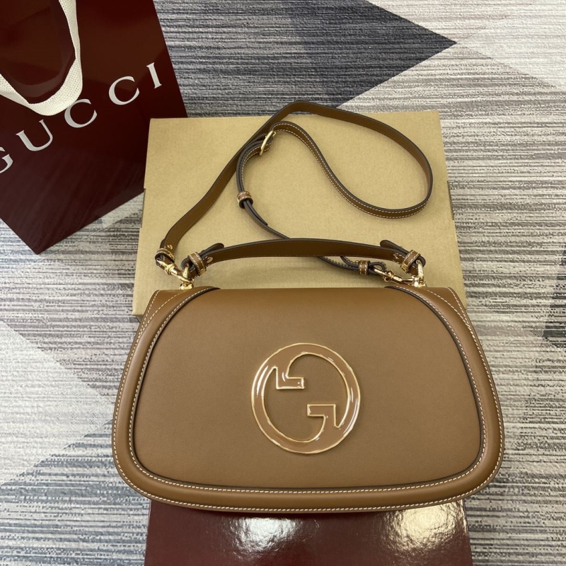 G*u*i top handle bags